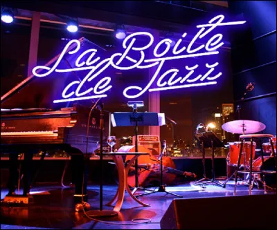 Who is the singer-songwriter of the song ''La Boite de jazz''?