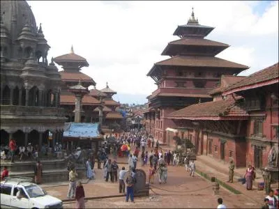 In Kathmandu, the flag of the country has the shape of two ----------.